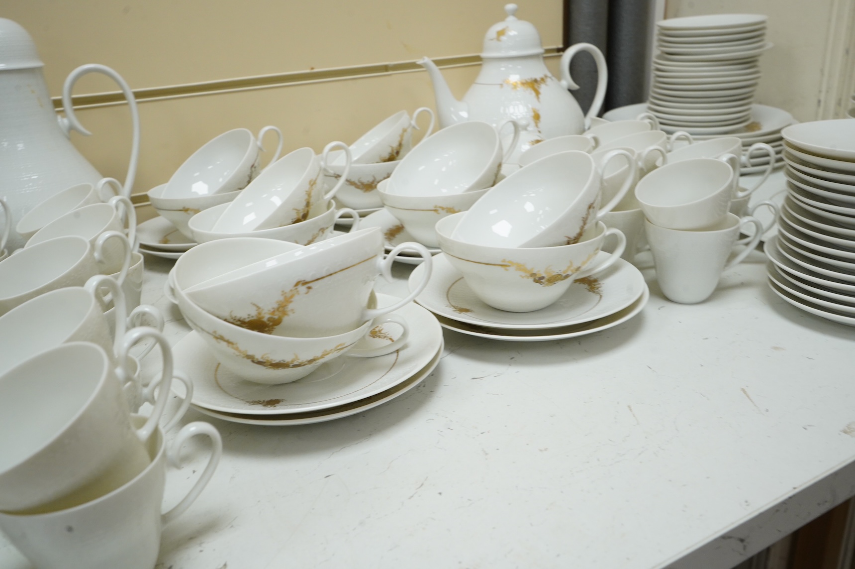 A Rosenthal studio line gilt decorated tea and coffee set to include cups and saucers, tea and coffee pot and side plates